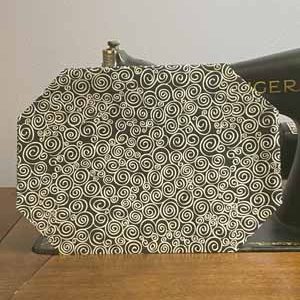 White Spirals on Black Mask